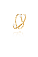 Isolated image of the Adria Pearl Ring, featuring a twisted gold band with two pearls, highlighting its modern and sophisticated design.