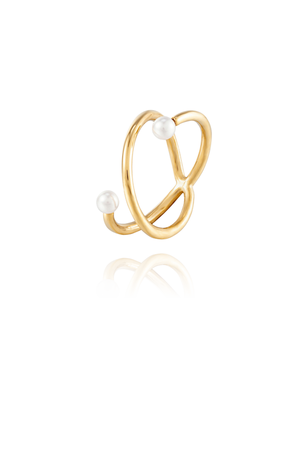 Isolated image of the Adria Pearl Ring, featuring a twisted gold band with two pearls, highlighting its modern and sophisticated design.