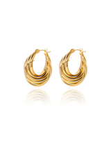 A pair of shell like gold hoops without background on display
