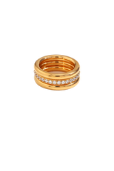 Isolated image of a gold triple band stacking ring set, featuring a sleek design with sparkling zirconia accents, against a white background, from shnco.