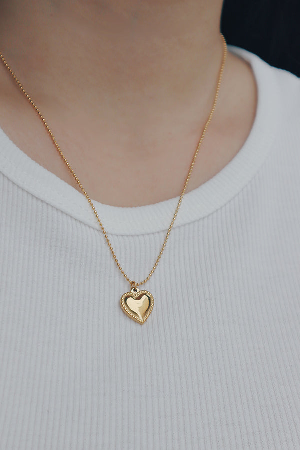 Elegant 18K gold-plated heart beads necklace from SH & Co., showcasing small heart charms with a polished finish for a romantic touch.