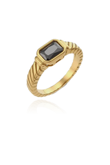 A striking gold-plated ring showcasing a rectangular-cut black cubic zirconia gemstone. The band features a distinct textured design, resembling a twisted rope, which enhances the overall allure of the ring. The deep, dark stone contrasts beautifully with the gold setting, creating a bold statement piece perfect for adding an edge to your ensemble.