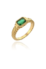 A captivating gold-plated ring with a vibrant rectangular-cut green cubic zirconia gemstone. The band is intricately designed with a twisted rope pattern, adding a unique flair to the piece. The lush green stone is encased in a smooth bezel setting, making this ring an eye-catching addition to your jewelry collection, ideal for adding a pop of color to any look.