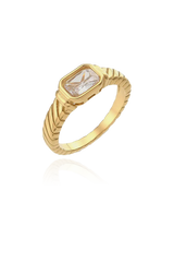 A sophisticated gold-plated ring featuring a rectangular-cut white cubic zirconia gemstone. The band is adorned with a textured design that resembles a rope pattern, adding a touch of elegance and refinement to the piece. The clear, sparkling stone is set securely within a sleek bezel, making it a versatile and timeless accessory for any outfit.