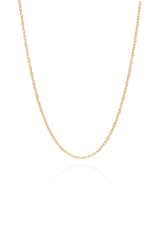 Close-up of a gold chain necklace from SH & Co., perfect for essential layering, featuring a delicate design.