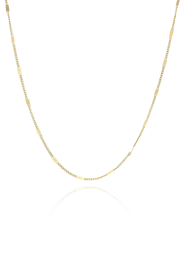 A versatile gold chain necklace from SH & Co., designed for essential layering, featuring lightweight links.