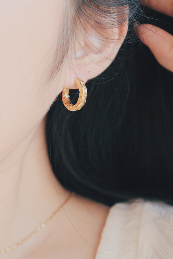 woman recommend waterproof gold hoops for everyday wear