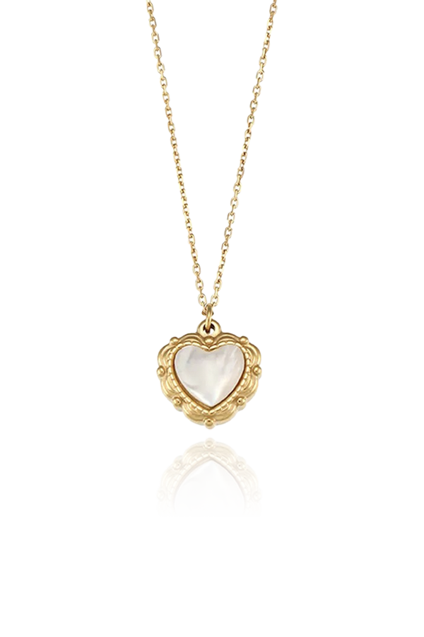 Product image of the Hermia shell heart necklace, featuring a heart-shaped mother-of-pearl pendant set in a gold beaded frame, displayed on a white background.