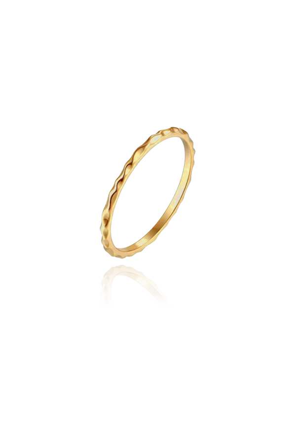 A product image of a slim gold ring, displayed flat to showcase its design. The ring features a delicate, wavy pattern along the band, making it a versatile and stylish piece for stacking or wearing on its own.