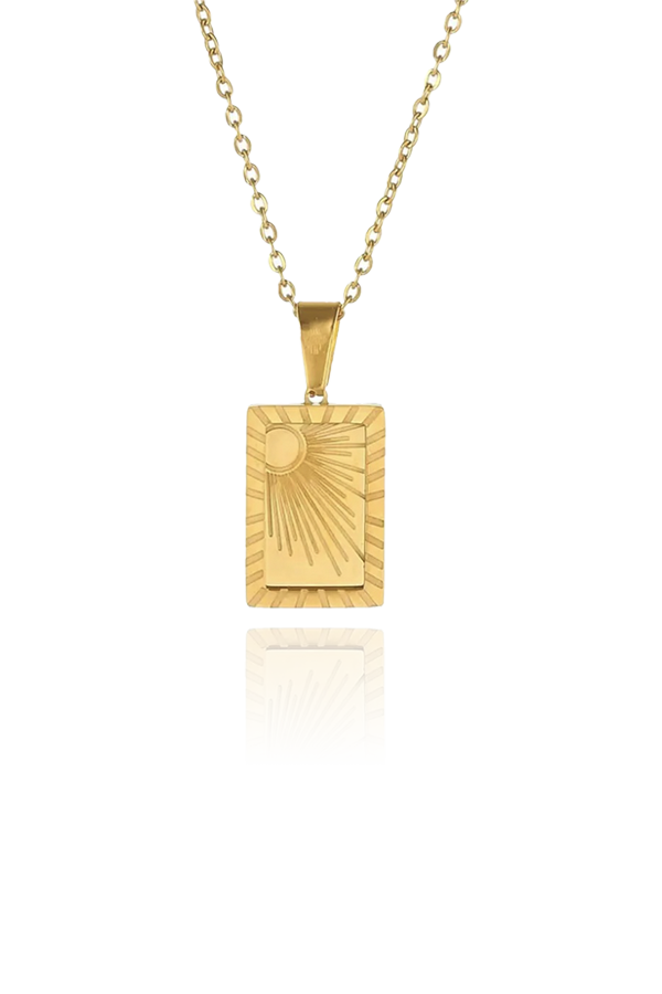 Product image of the Savita Sun necklace, featuring a rectangular pendant with an engraved sunburst design on a delicate gold chain, displayed on a white background.